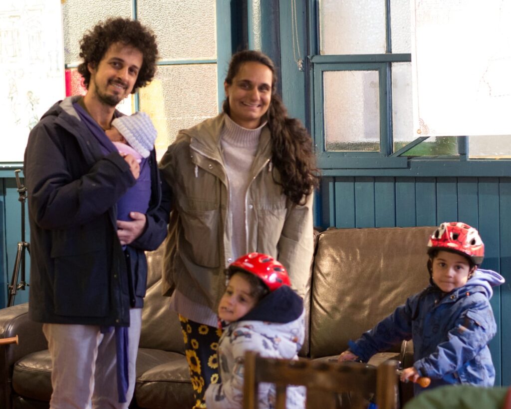 A family of cyclists at Second Saturday