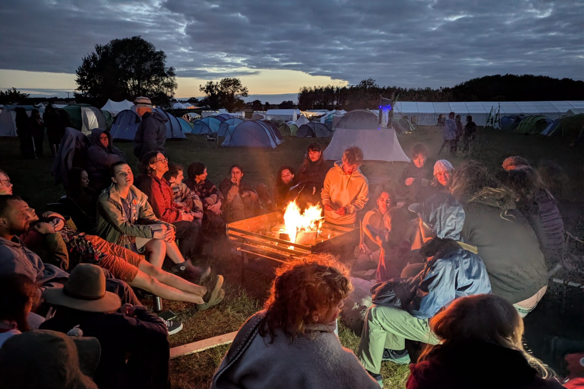 Young people at a fireside